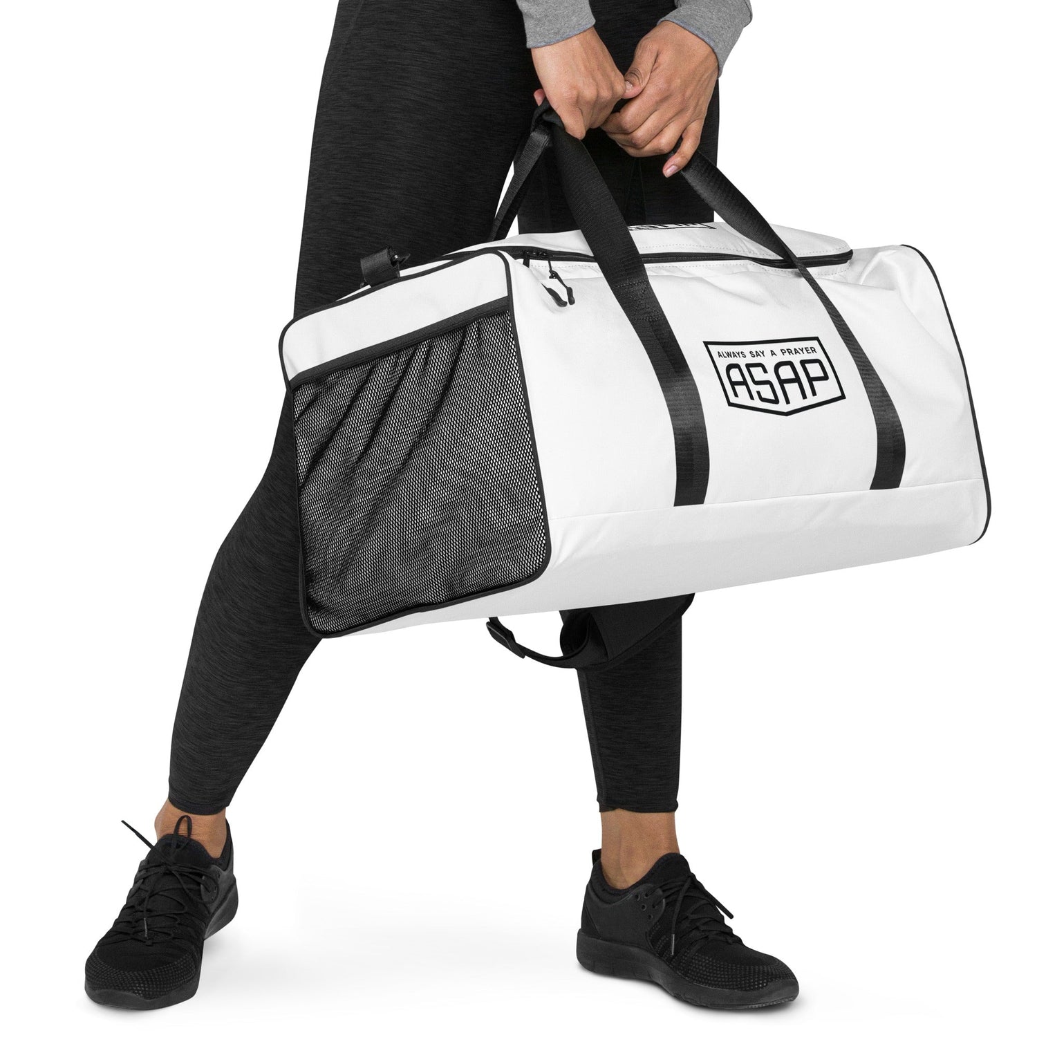 girl folding white duffle bag with ASAP Logo