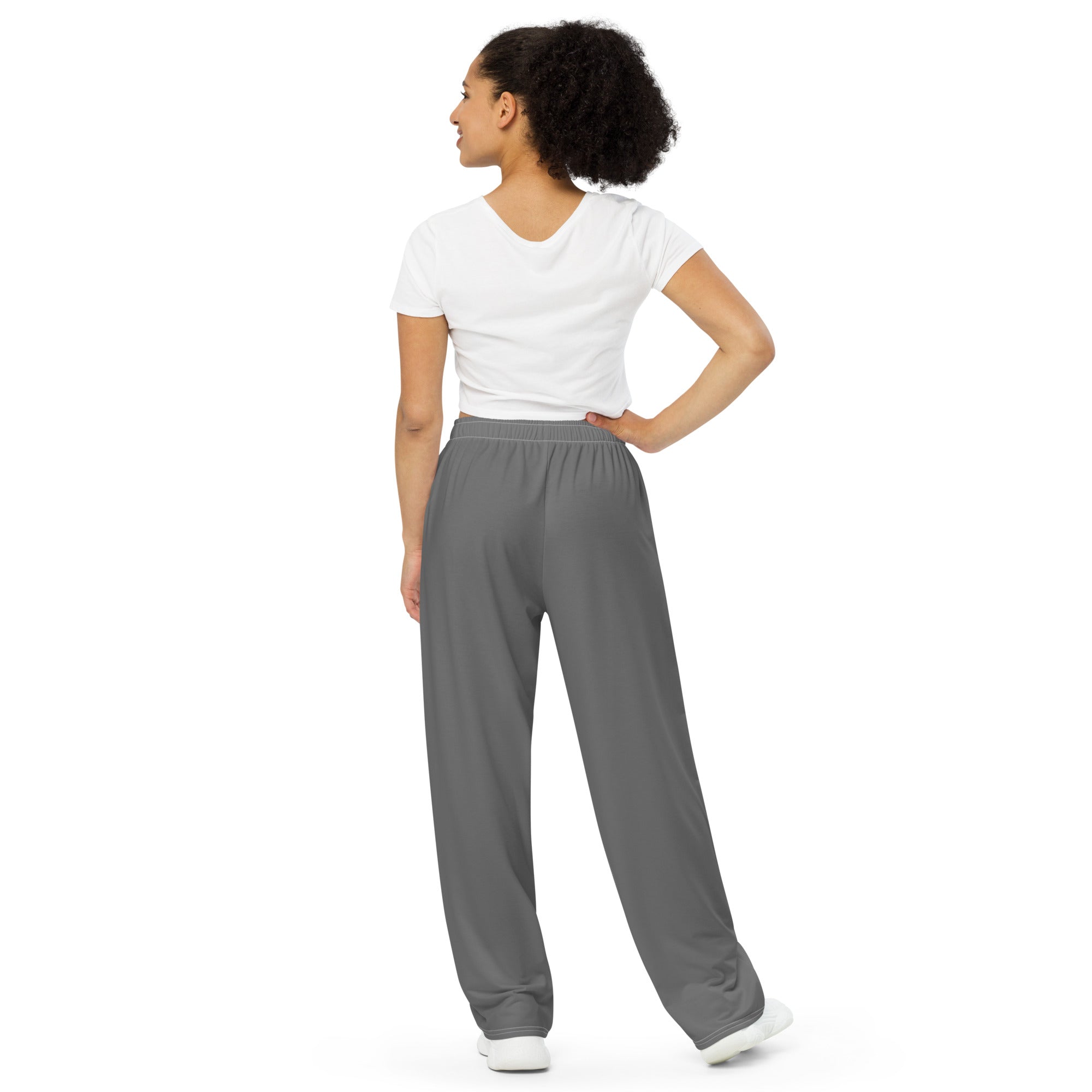 women wearing a gray all over print unisex wide leg with white asap print
