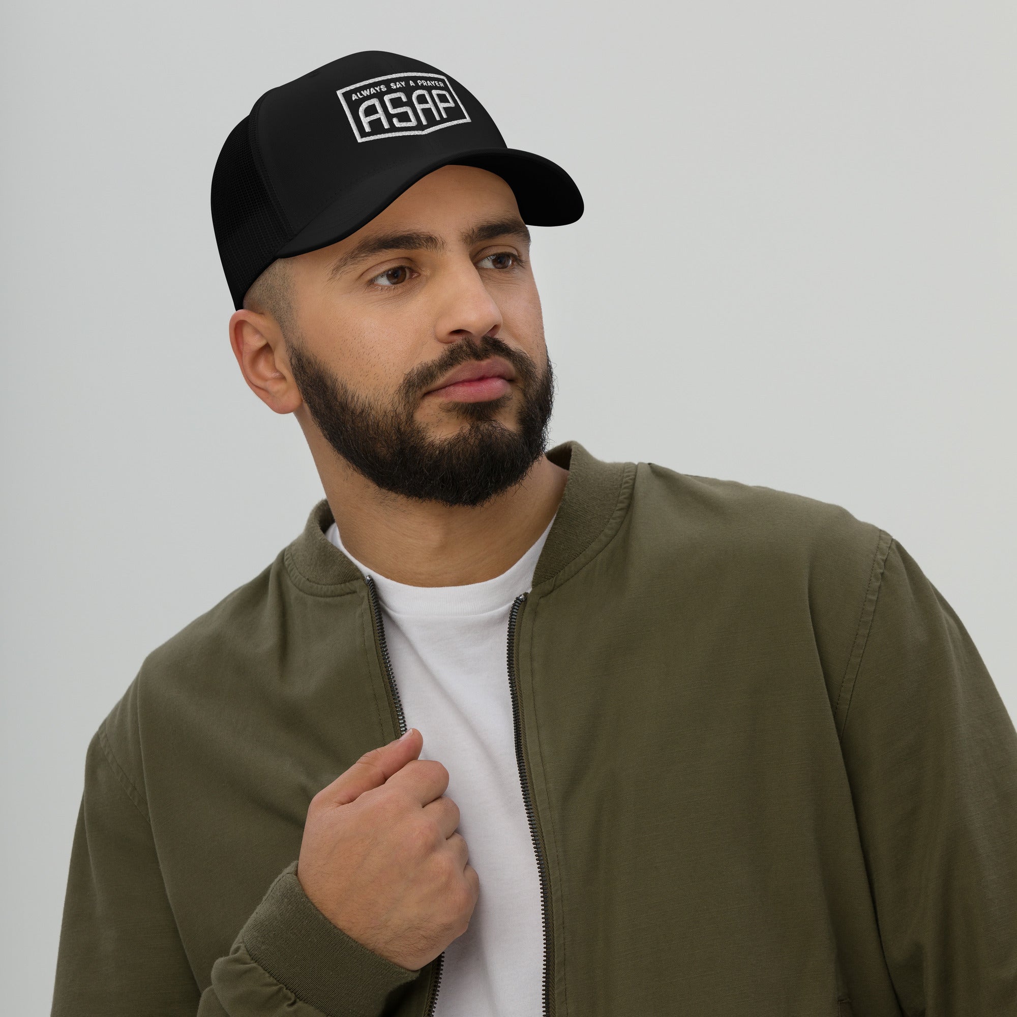 men wearing a black retro trucker hat with white asap print