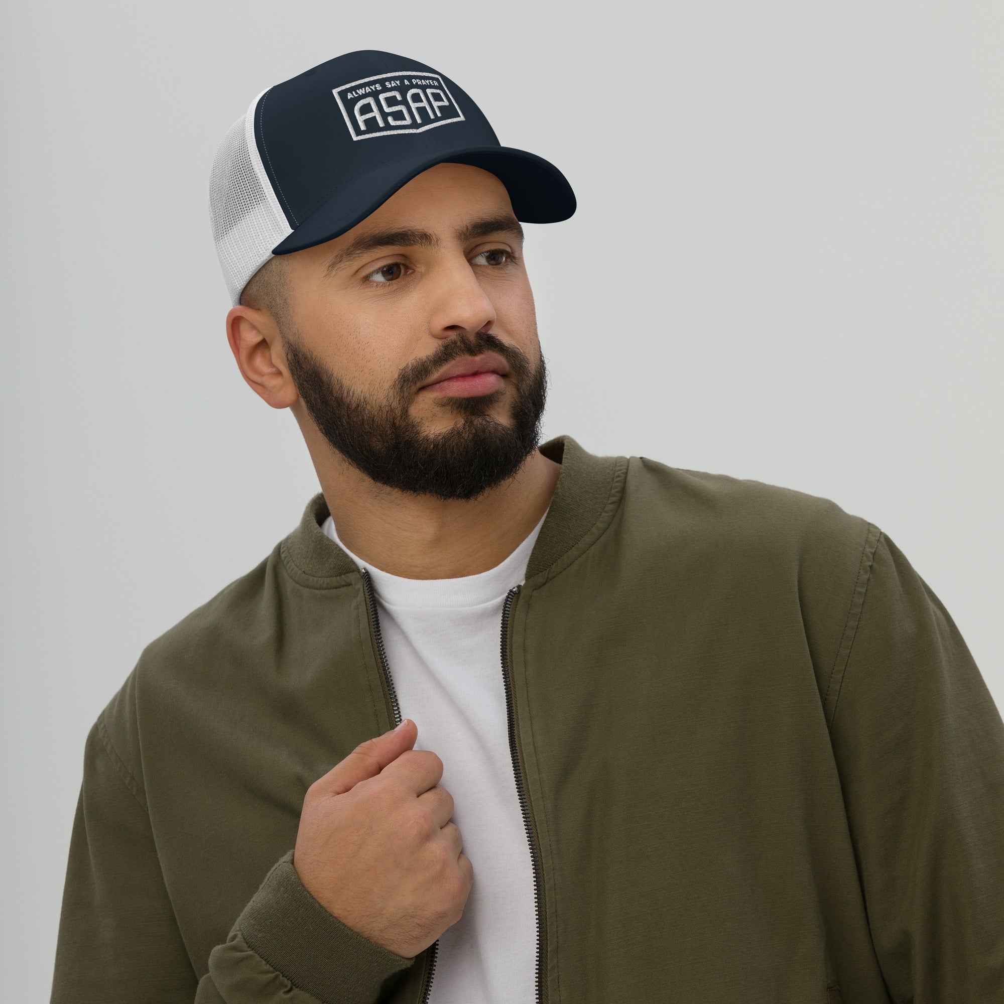 men wearing a navy blue retro trucker hat with white asap print