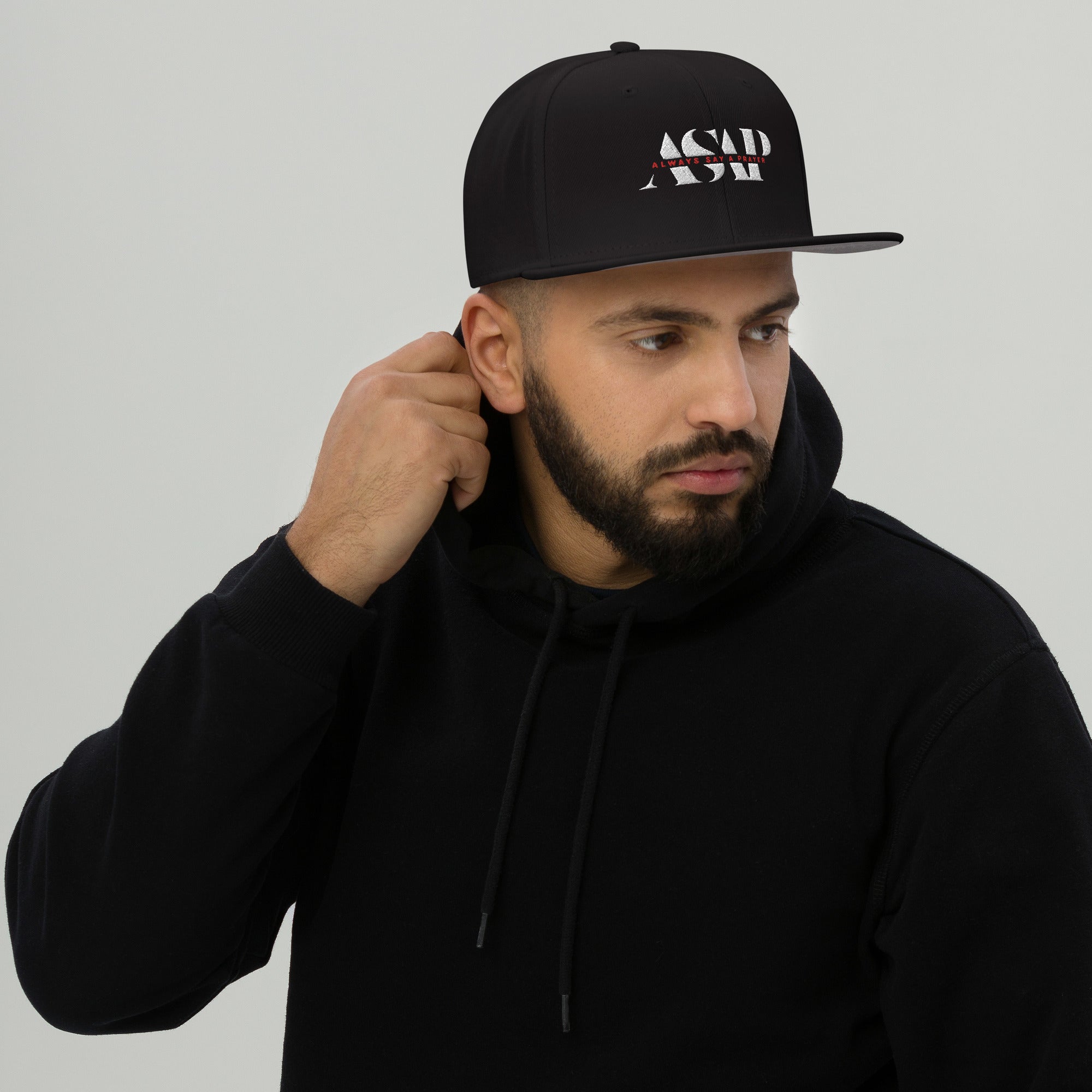 men wearing a classic black dad hat with white asap print