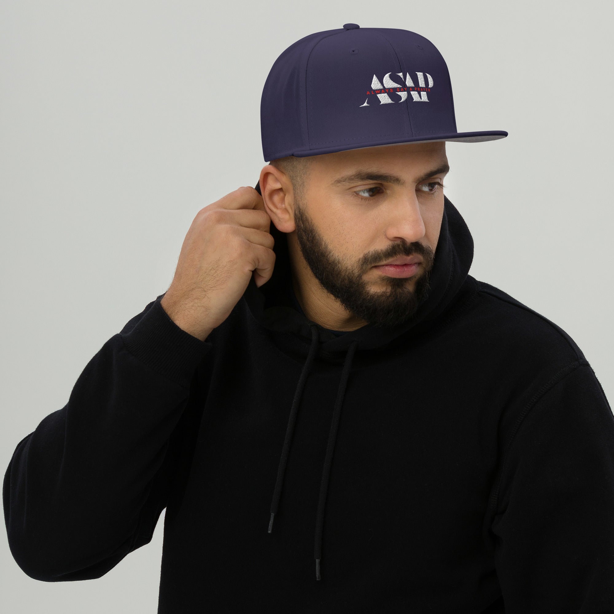 men wearing a classic navy blue dad hat with white asap print