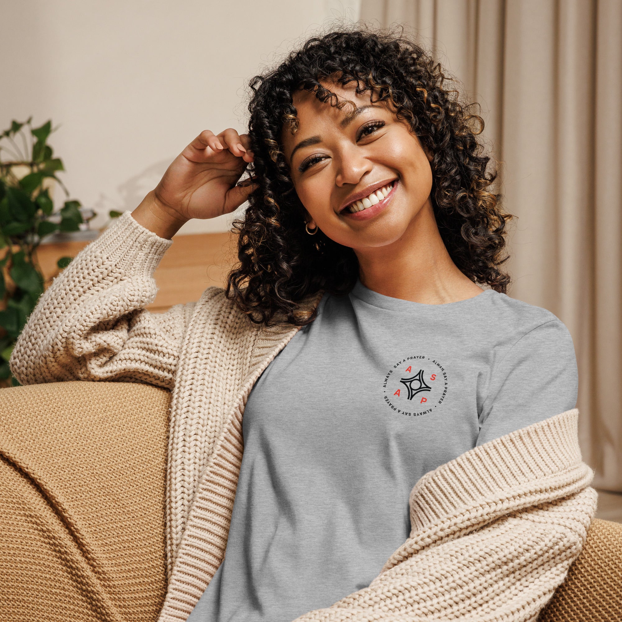 women wearing a grey relaxed t shirt with white asap print