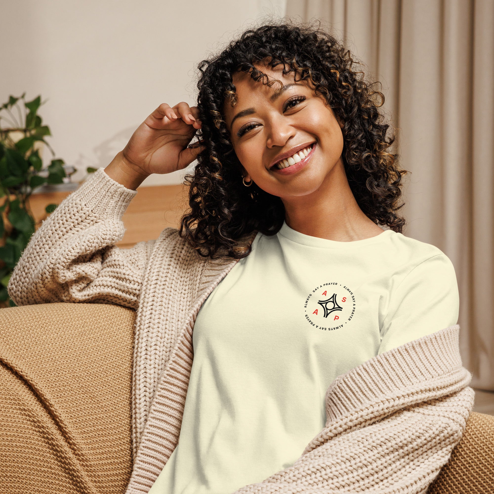 women wearing a light green relaxed t shirt with white asap print